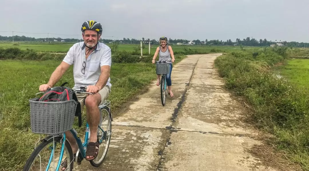 Cycling and Sunset River Cruise Experience in Hoi An