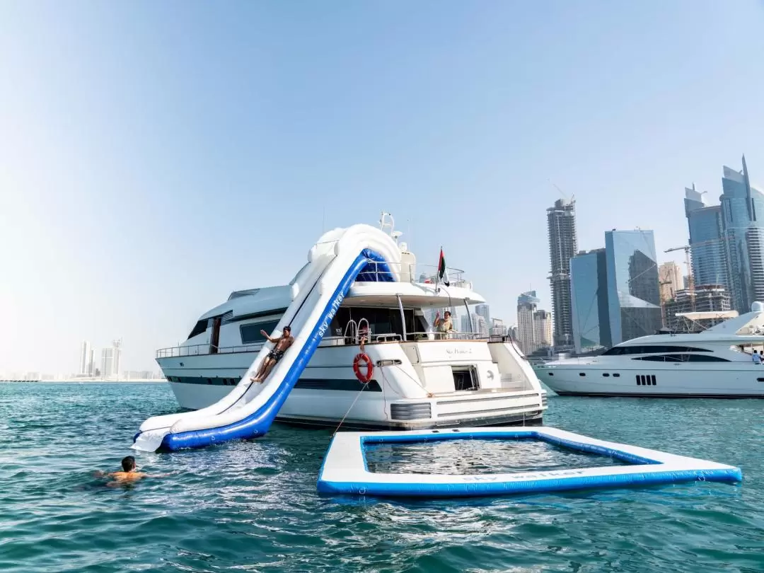 Yacht Ride & Slide, Swim & Snorkel with BBQ Lunch in Dubai