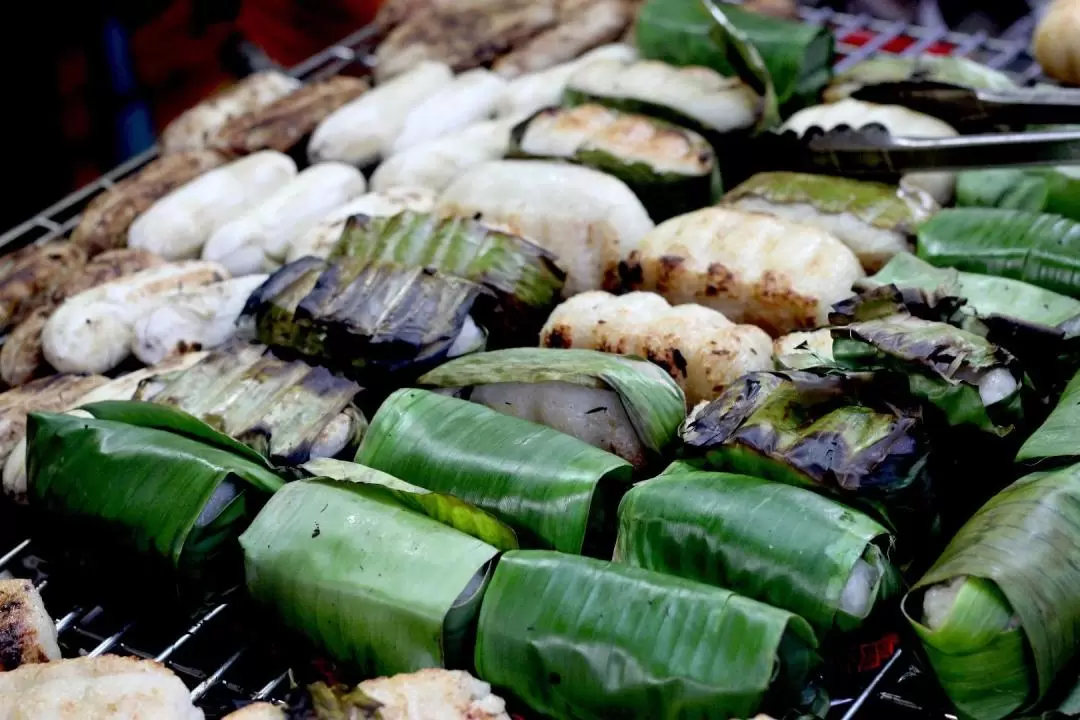 Street Food and Sightseeing Night Tour with Aodai Rider in Saigon