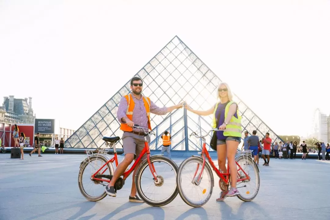 Paris Night Bike Tour with Boat Cruise on the Seine