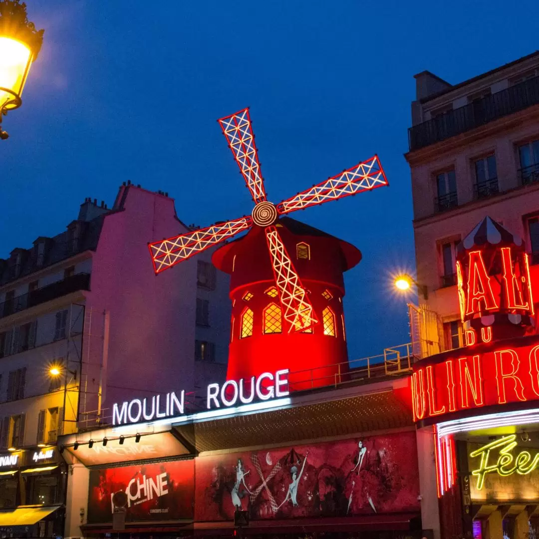 Moulin Rouge Show with Dinner and City Bus Tour in Paris